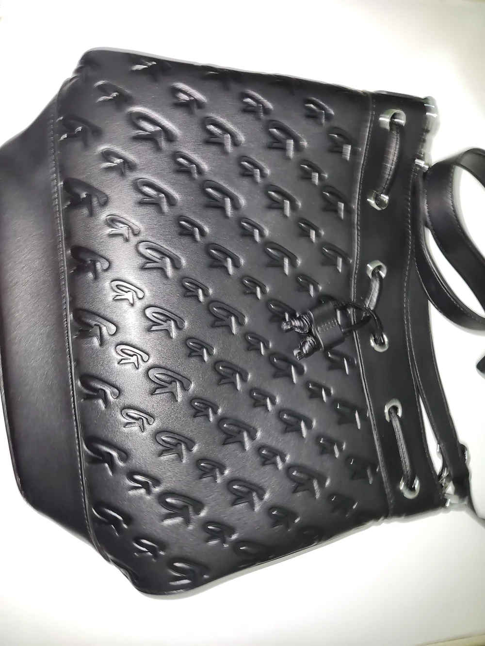 Embossed Black Crossbody Drawstring Bag
